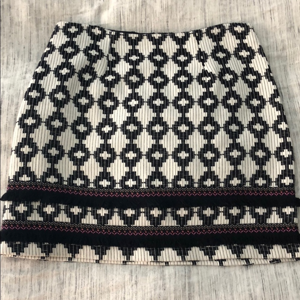Black and white mini skirt with fringe trim